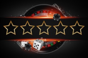 5 gold stars across a hyper real casino wheel with black background and floating dice and casino chips and a red neon beam across image